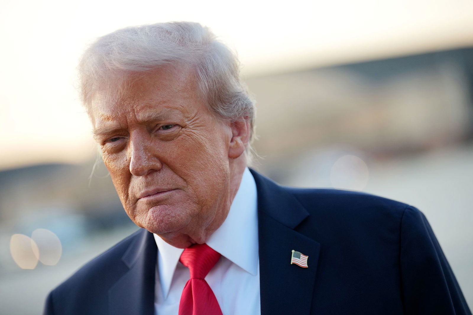 <i>Kevin Dietsch/Getty Images via CNN Newsource</i><br/>President Donald Trump speaks to reporters after stepping off Air Force One at Joint Base Andrews