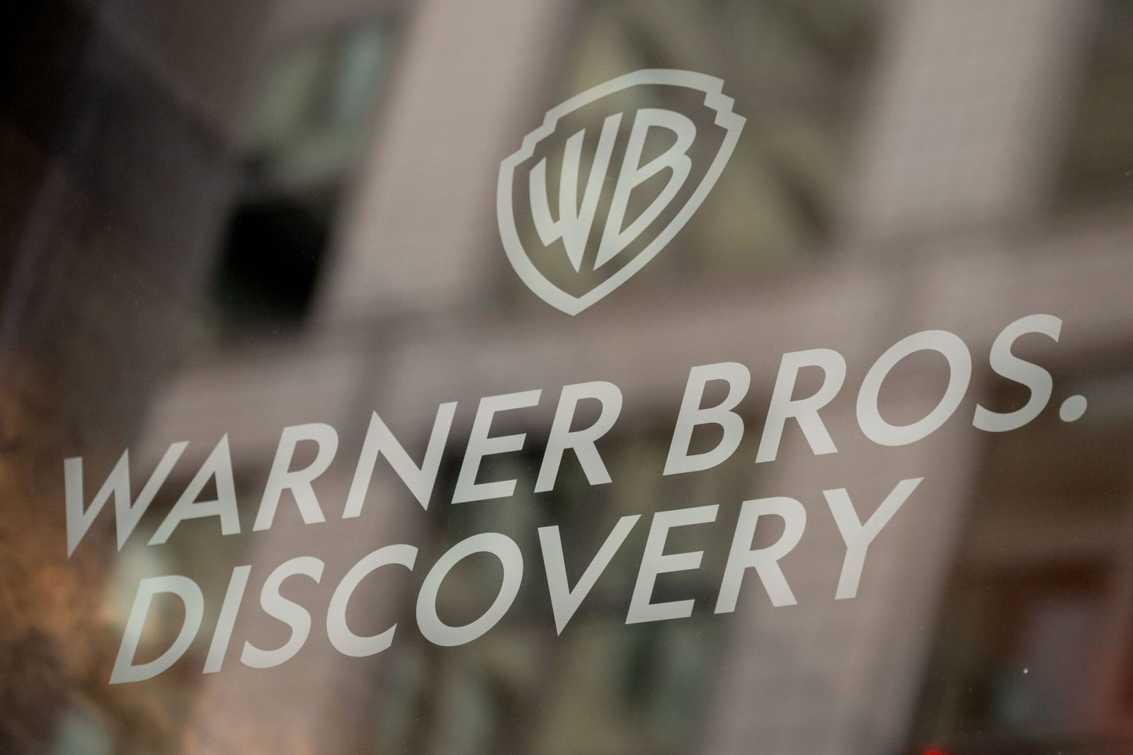 <i>Victor J. Blue/Bloomberg/Getty Images via CNN Newsource</i><br/>The Warner Bros. Discovery logo is seen at the company’s headquarters in New York.