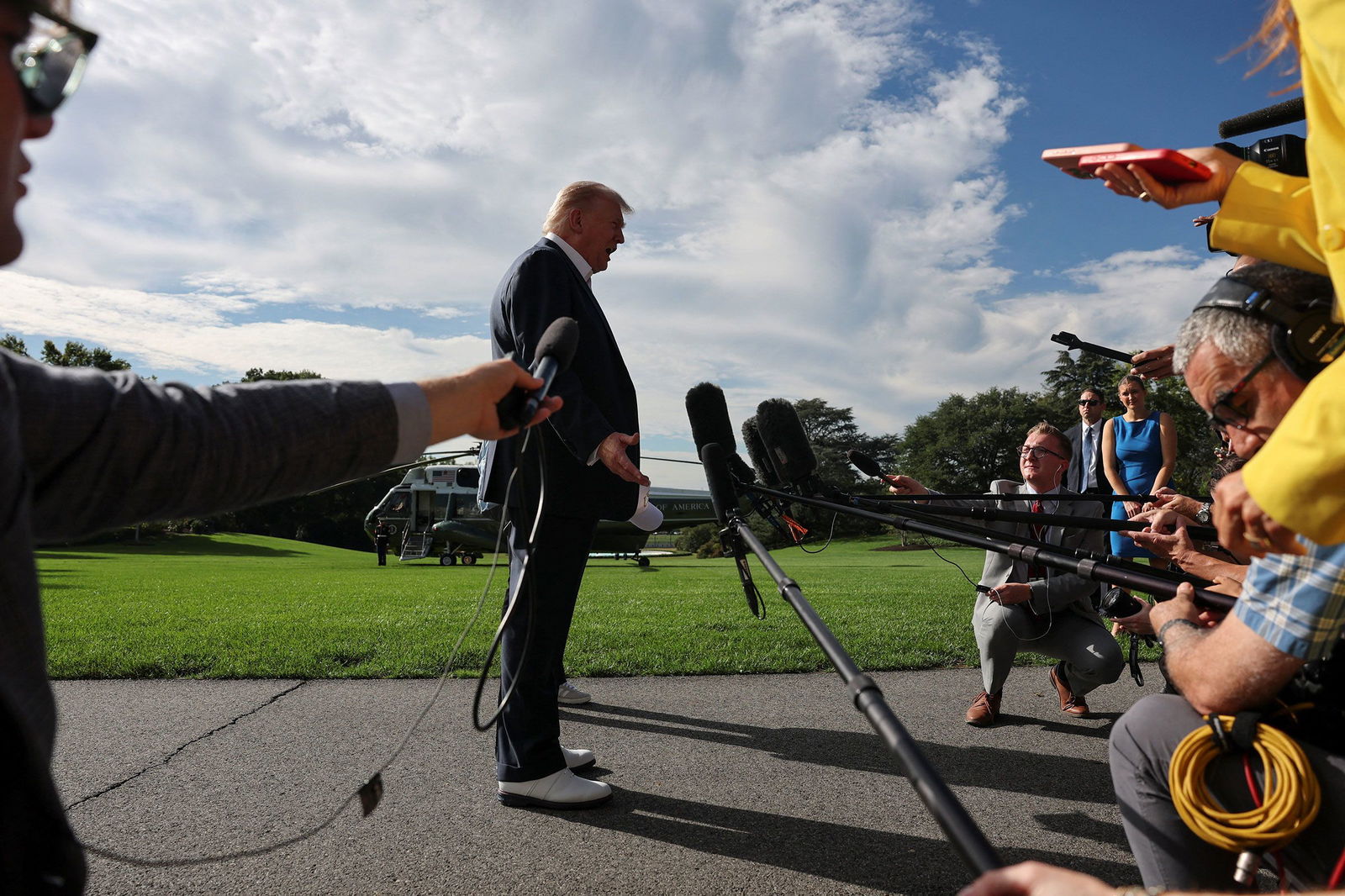 <i>Jonathan Ernst/Reuters via CNN Newsource</i><br/>President Donald Trump speaks to the media before departing from the White House on September 26.