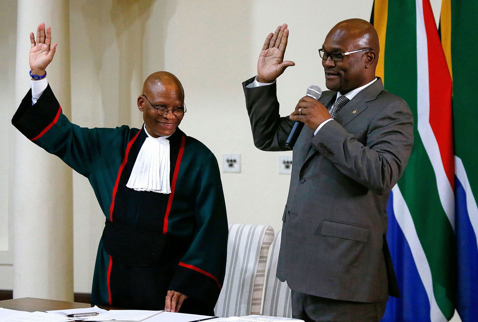 <i>Phill Magakoe/AFP/Getty Images via CNN Newsource</i><br/>Mthethwa (right) being sworn in as South Africa's minister of sports