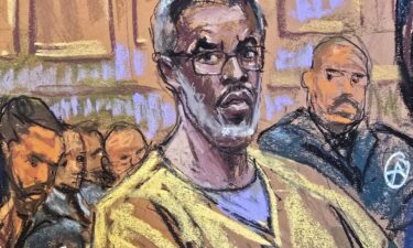 Sean "Diddy" Combs listens as lawyer Alexandra Shapiro (not seen) argue during a hearing over his bid to overturn his conviction on charges of transportation to engage in prostitution