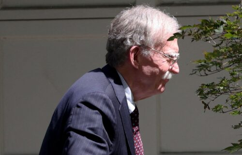 Former White House national security adviser John Bolton arrives at his house in Bethesda