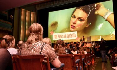Taylor Swift fans react during a listening event for Swift's new album 'The Life of a Showgirl' at the Astor Theatre in Melbourne