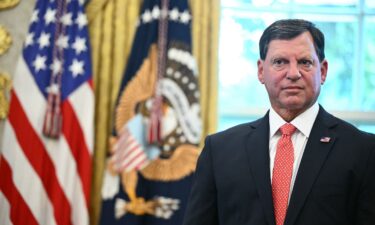 Commissioner of the Social Security Administration Frank Bisignano joins President Donald Trump in the Oval Office of the White House on August 14