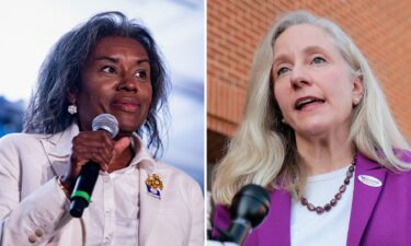 Jay Jones speaks to the audience during an Abigail Spanberger bus tour stop in Fairfax
