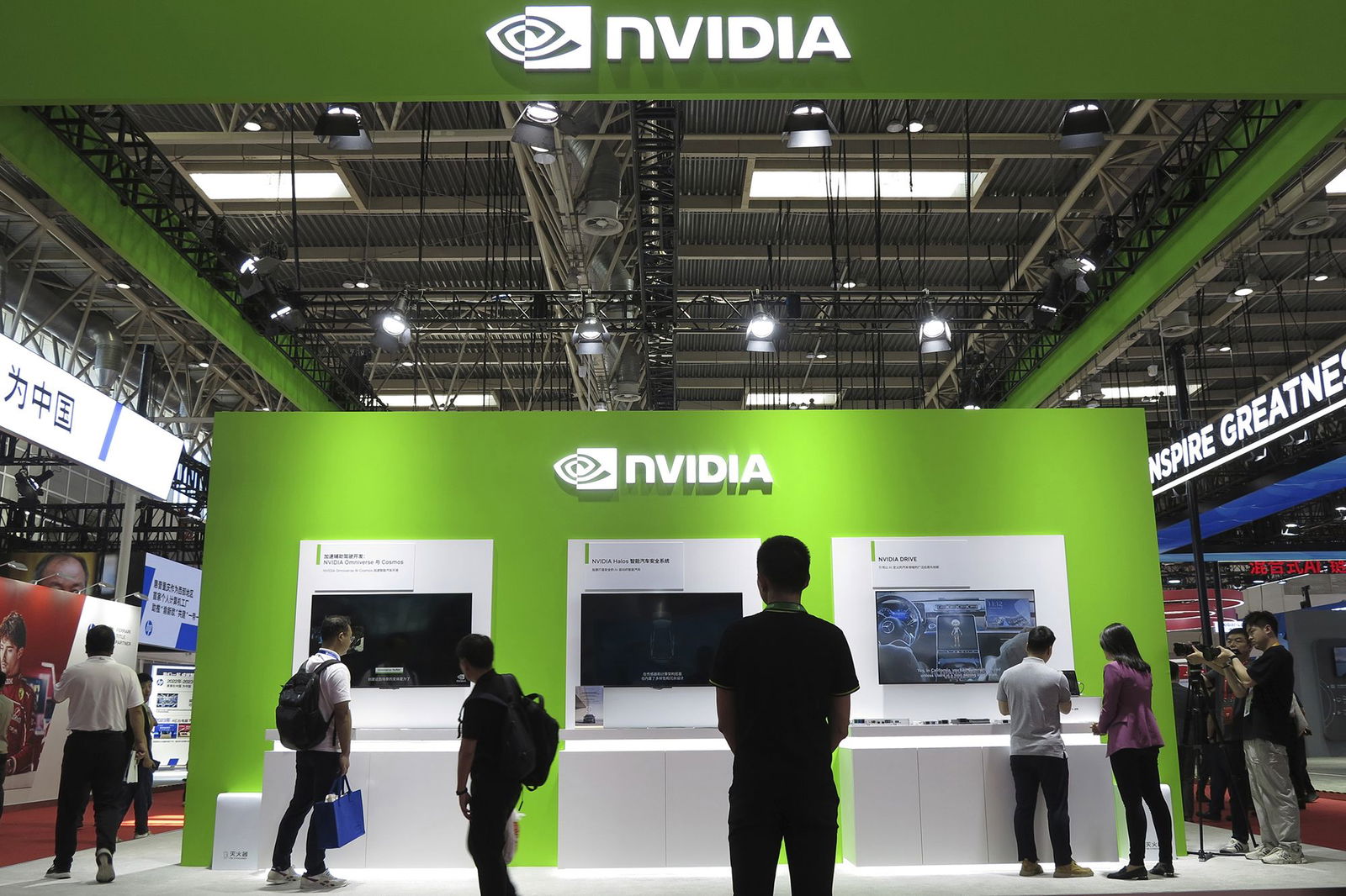 <i>An Ming/FeatureChina/AP via CNN Newsource</i><br/>People visit the booth of Nvidia at a supply chain expo in Beijing on July 17.