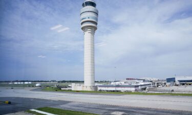 The air traffic control tower is seen from the Hartsfield-Jackson Atlanta International Airport terminal