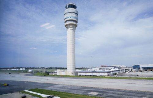 The air traffic control tower is seen from the Hartsfield-Jackson Atlanta International Airport terminal