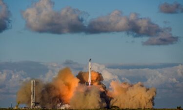A SpaceX Super Heavy booster carrying the Starship spacecraft lifts off on its 11th integrated test flight at the company's launchpad in Starbase