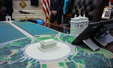 A plan for an arch across from the Lincoln Memorial is seen on the Resolute Desk as US President Donald Trump meets with Finnish President Alexander Stubb and Prime Minister Petteri Orpo in the Oval Office of the White House in Washington