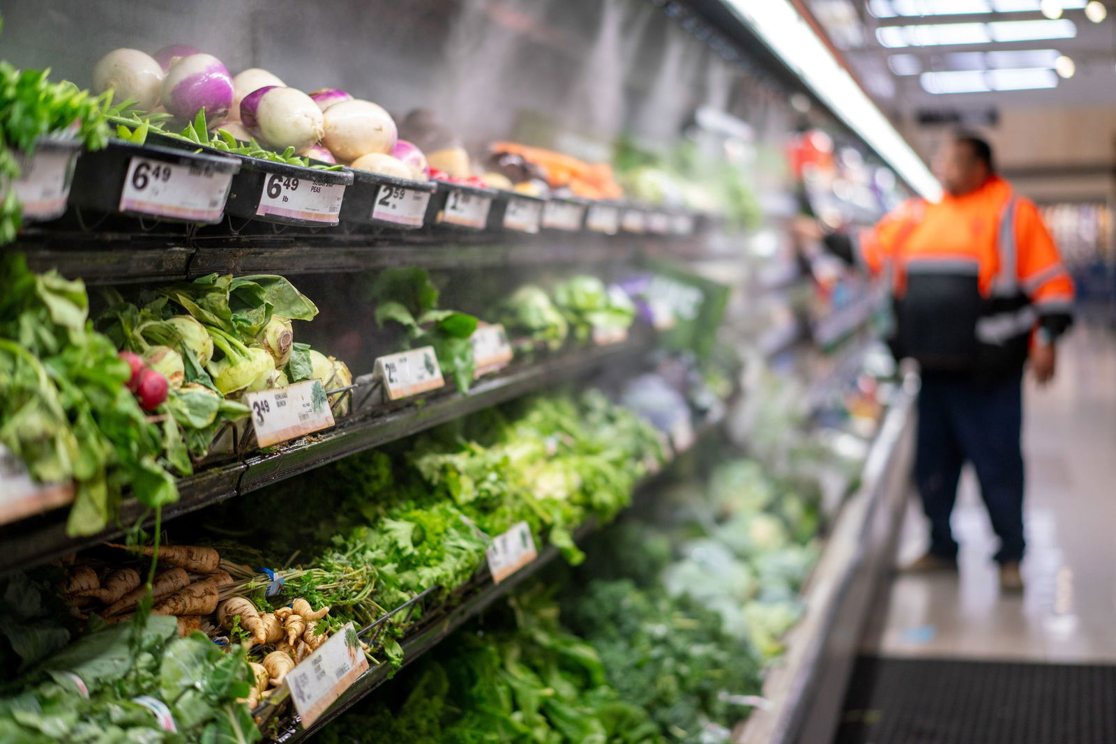 <i>Kyle Grillot/Bloomberg/Getty Images via CNN Newsource</i><br/>Misters spray produce at a grocery store in Dayton