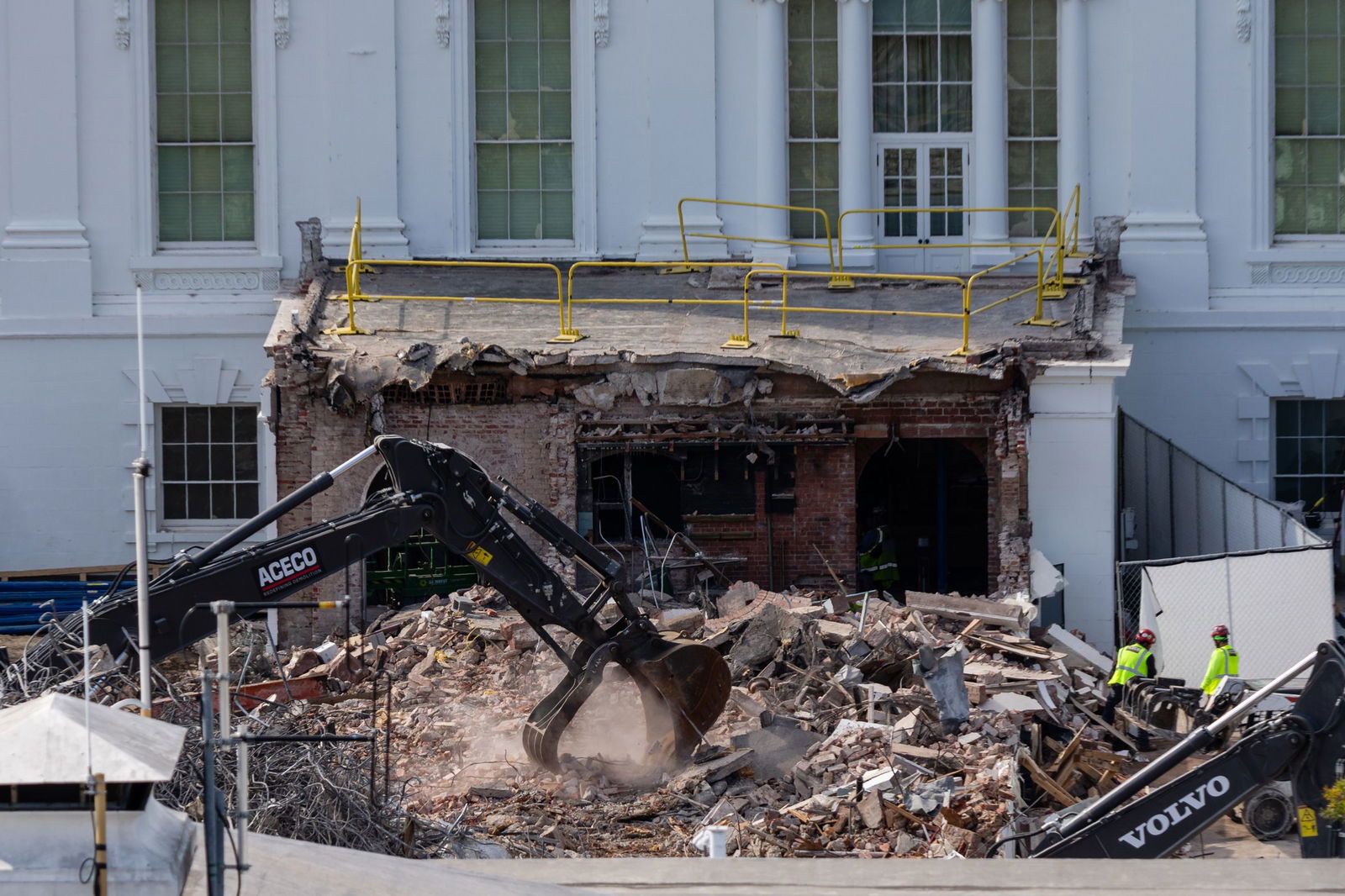 <i>Eric Lee/Getty Images via CNN Newsource</i><br/>An excavator works to clear rubble after the East Wing of the White House was demolished on October 23