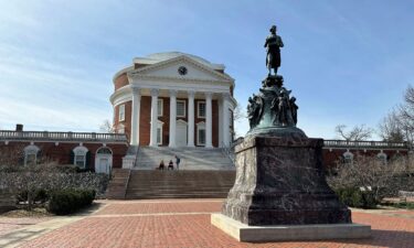 A statue of Thomas Jefferson stands in front of the Rotunda at the University of Virginia in Charlottesville