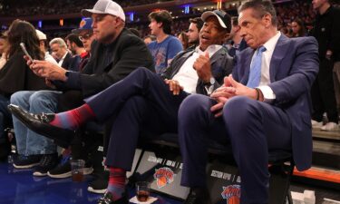 New York Mayor Eric Adams sits with independent candidate for the mayorship and former New York Gov. Andrew Cuomo at a New York Knicks game on Wednesday