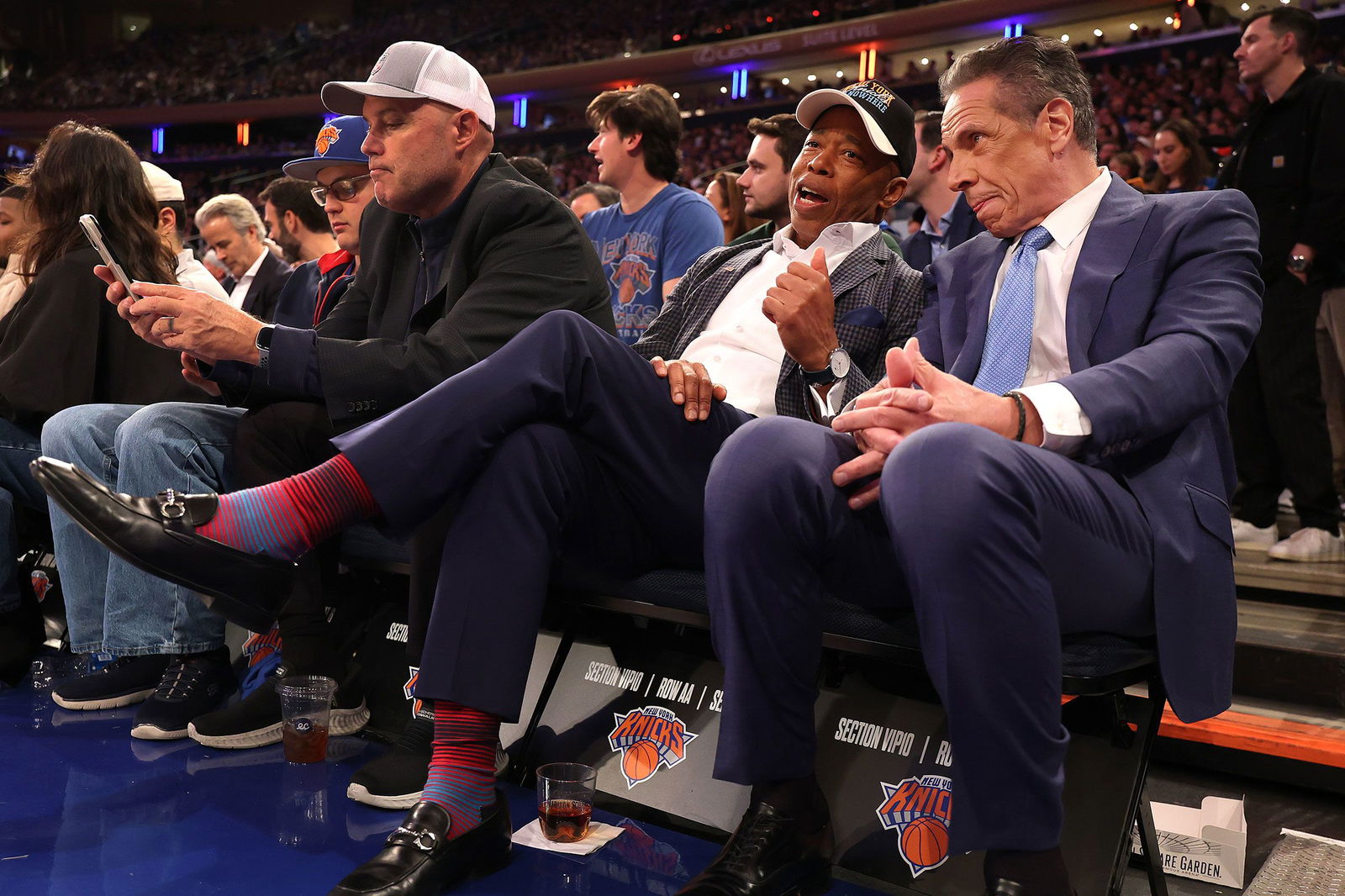 <i>Al Bello/Getty Images via CNN Newsource</i><br/>New York Mayor Eric Adams sits with independent candidate for the mayorship and former New York Gov. Andrew Cuomo at a New York Knicks game on Wednesday