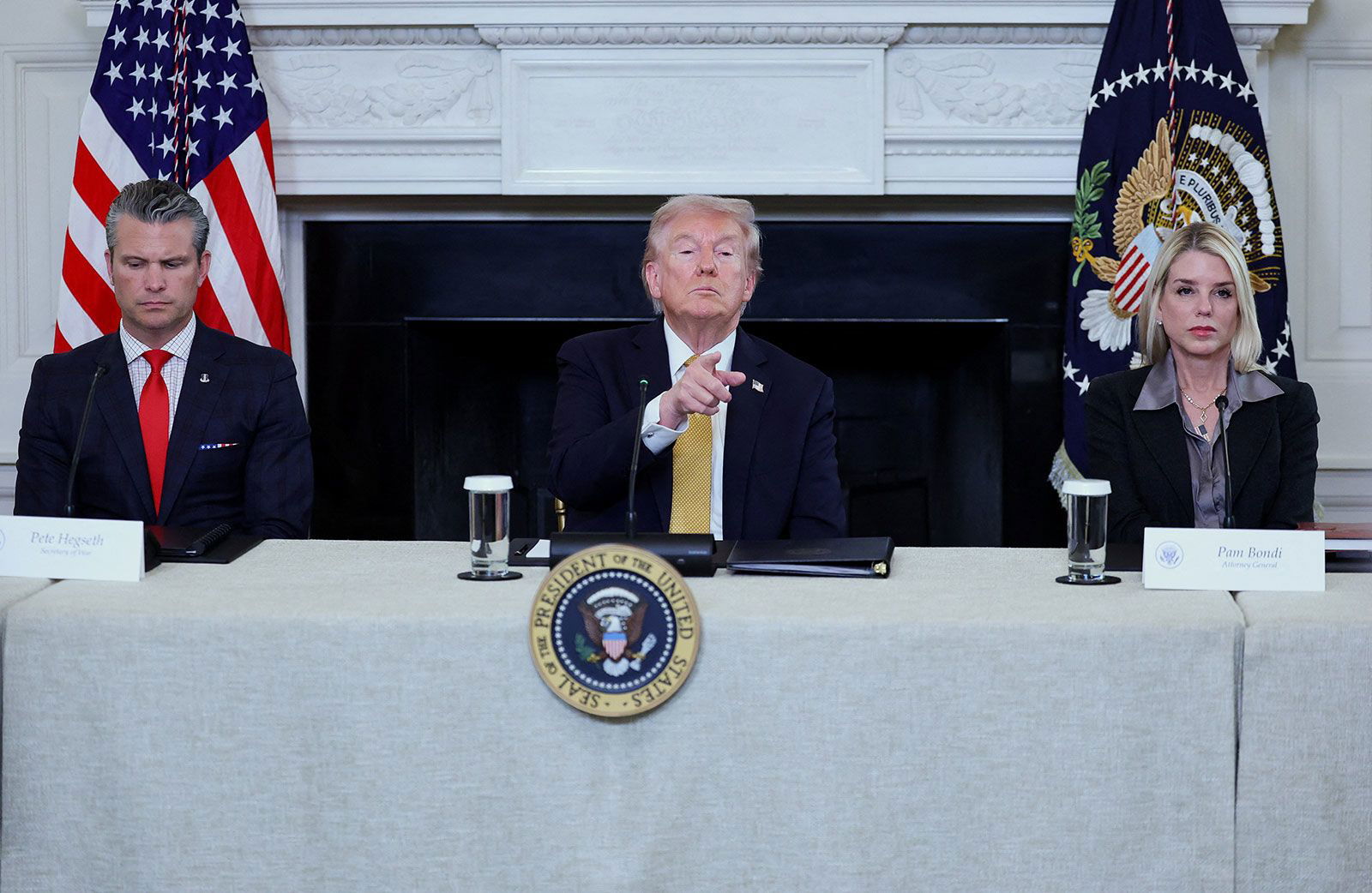 <i>Jonathan Ernst/Reuters via CNN Newsource</i><br/>US President Donald Trump gestures during an announcement regarding his administration's policies against cartels and human trafficking