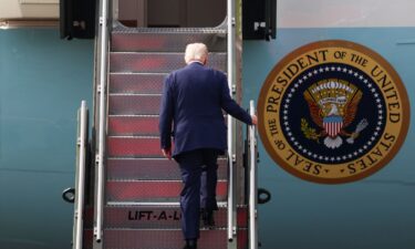 President Donald Trump boards Air Force One at Gimhae International Airport in Busan