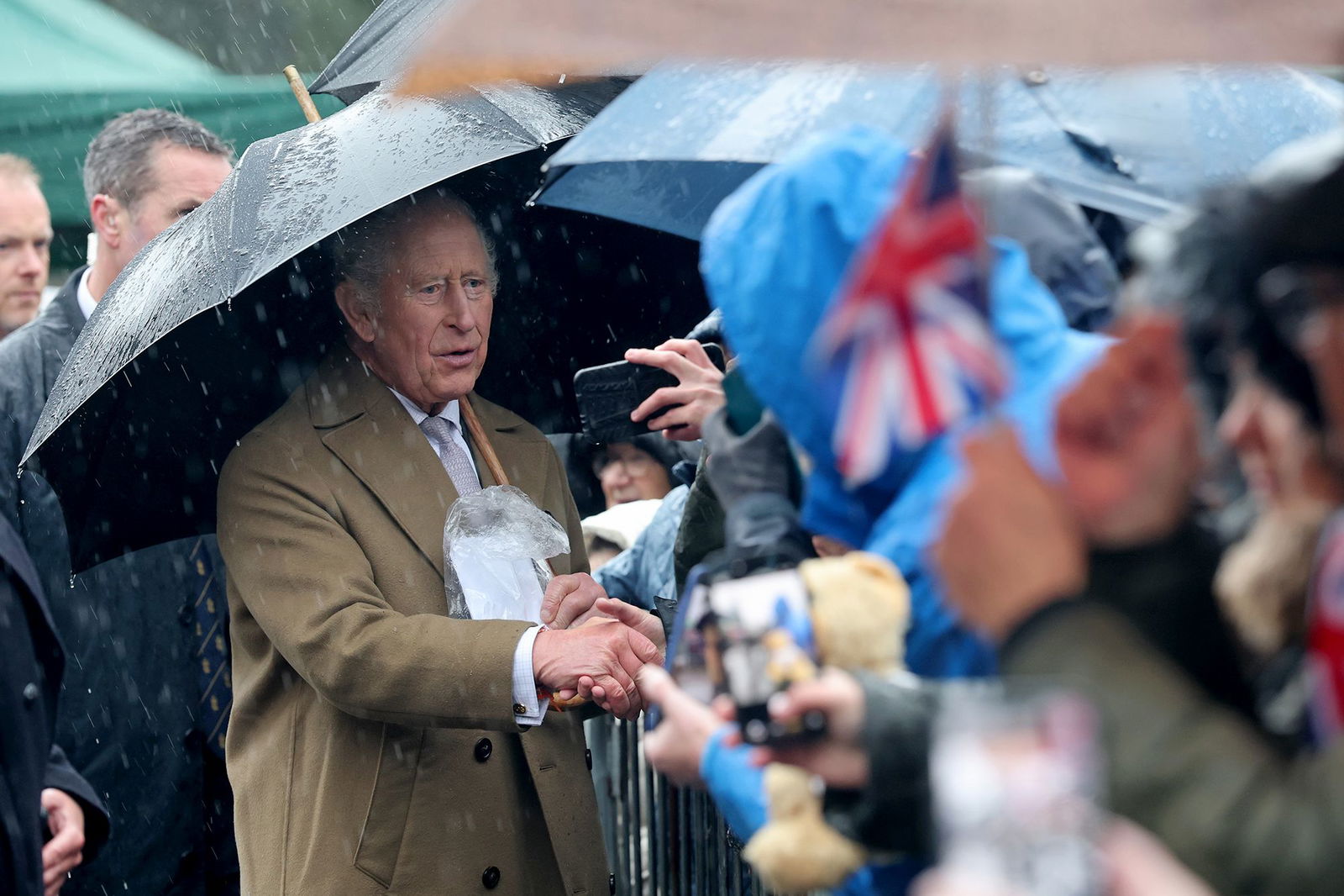 <i>Finnbarr Webster/Getty Images via CNN Newsource</i><br/>Charles briefly sat in the driver's seat of one of the new tram-trains at the South Wales Metro Train Depot.