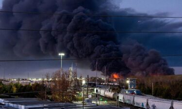 Smoke rises from the wreckage of a cargo jet after it crashed on departure from Louisville Muhammad Ali International Airport in Louisville