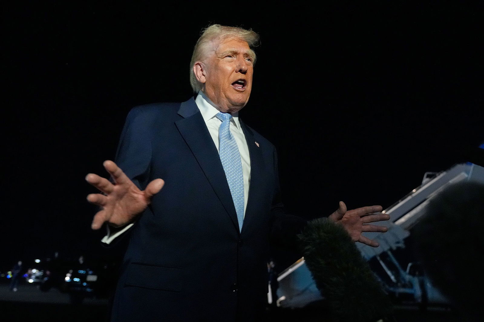 <i>Manuel Balce Ceneta/AP via CNN Newsource</i><br/>President Donald Trump speaks to reporters before boarding Air Force One at Palm Beach International Airport in West Palm Beach