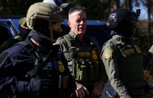 Top Border Patrol official Greg Bovino looks on during an immigration raid in Charlotte