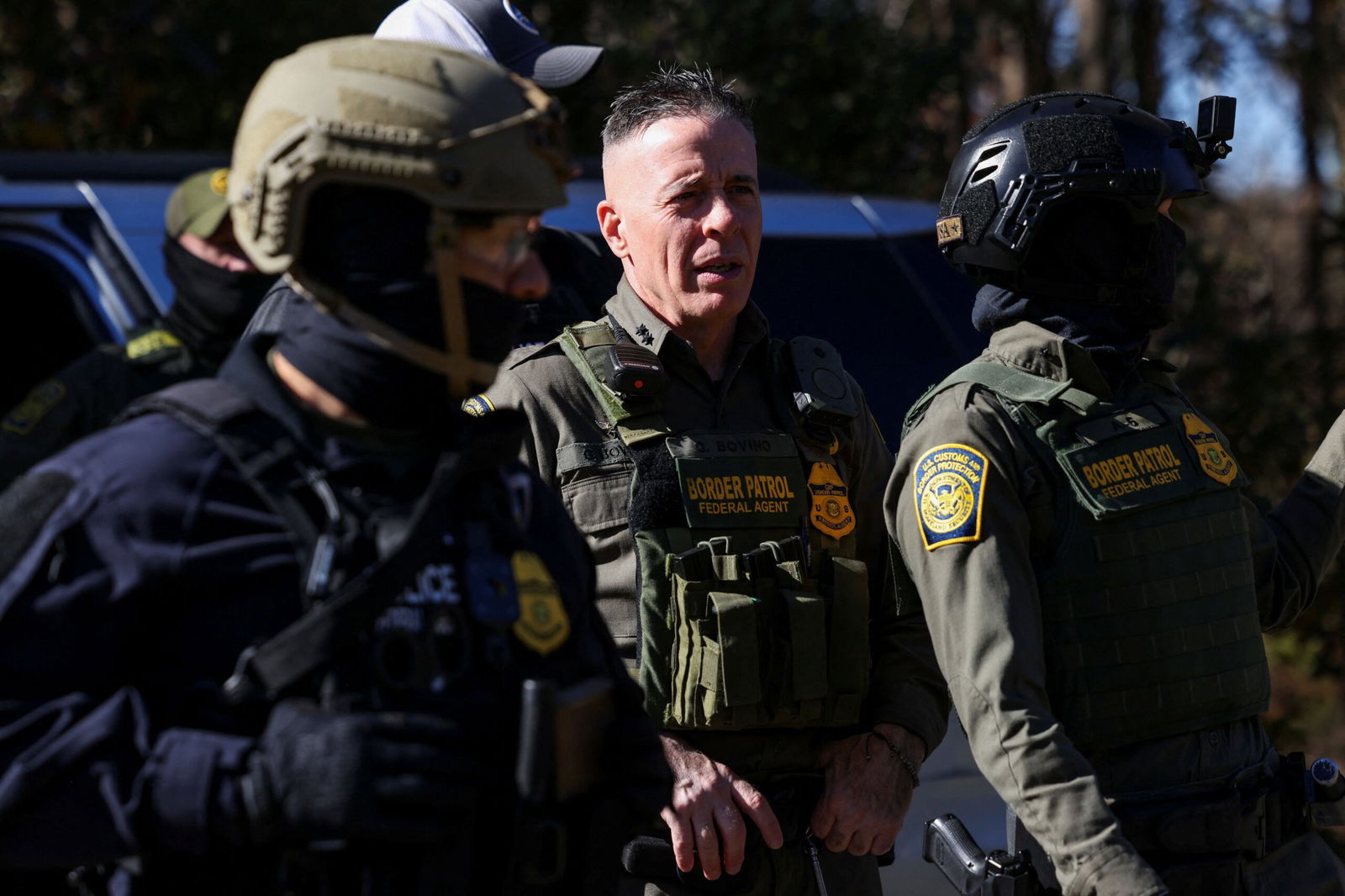 <i>Sam Wolfe/Reuters via CNN Newsource</i><br/>Top Border Patrol official Greg Bovino looks on during an immigration raid in Charlotte