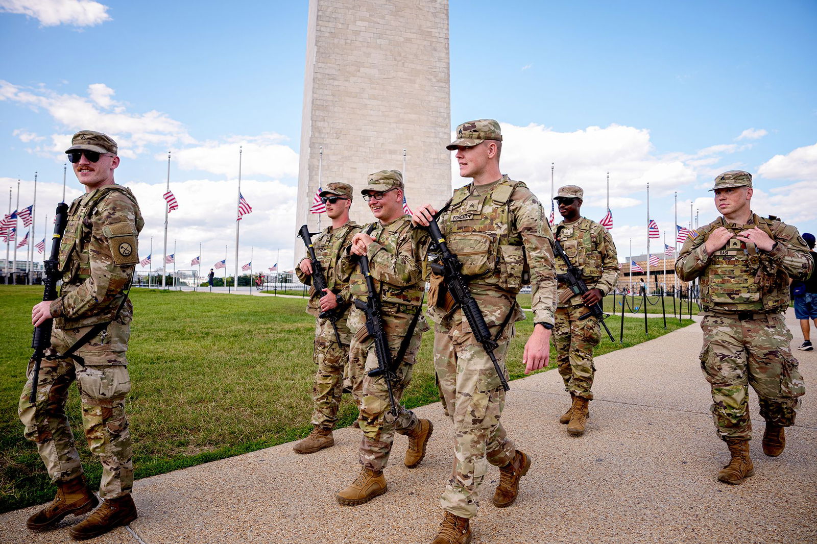 <i>Andrew Harnik/Getty Images via CNN Newsource</i><br/>The Washington Monument is visible as armed members of the National Guard patrol the National Mall on August 27 in Washington