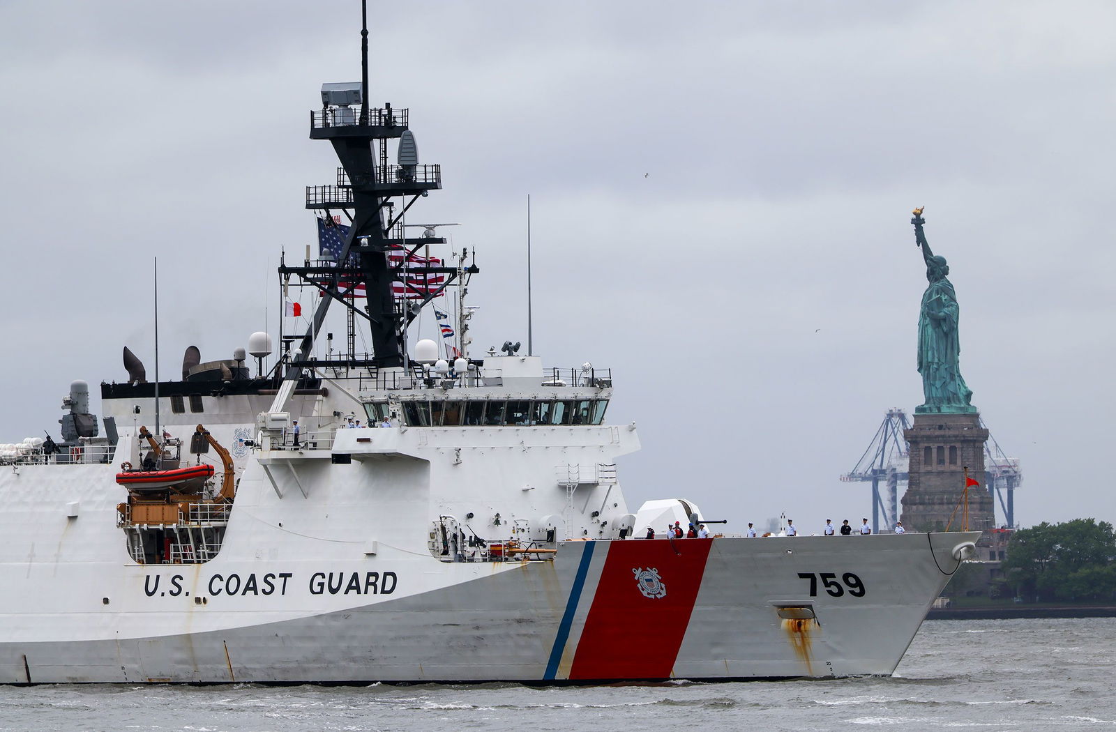 <i>Spencer Platt/Getty Images via CNN Newsource</i><br/>A Coast Guard ship sails past the Statue of Liberty on May 21 in New York City.