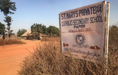 A signboard for St. Mary's Private Catholic School stands at the entrance of the school in Papiri