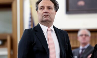 Investigators gather at the home of missing Cohasset