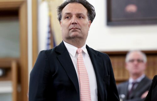 Investigators gather at the home of missing Cohasset