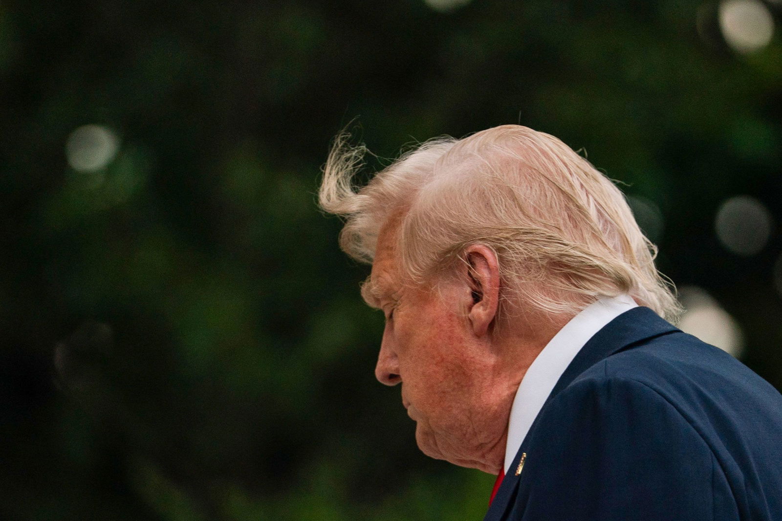 <i>Allison Robert/AFP/Getty Images/File via CNN Newsource</i><br/>President Donald Trump walks on the South Lawn upon arrival at the White House on July 13