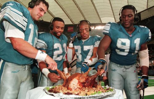 Dallas' DaRon Bland (L) and Dak Prescott enjoy some Thanksgiving turkey after a home win on the holiday in 2023.