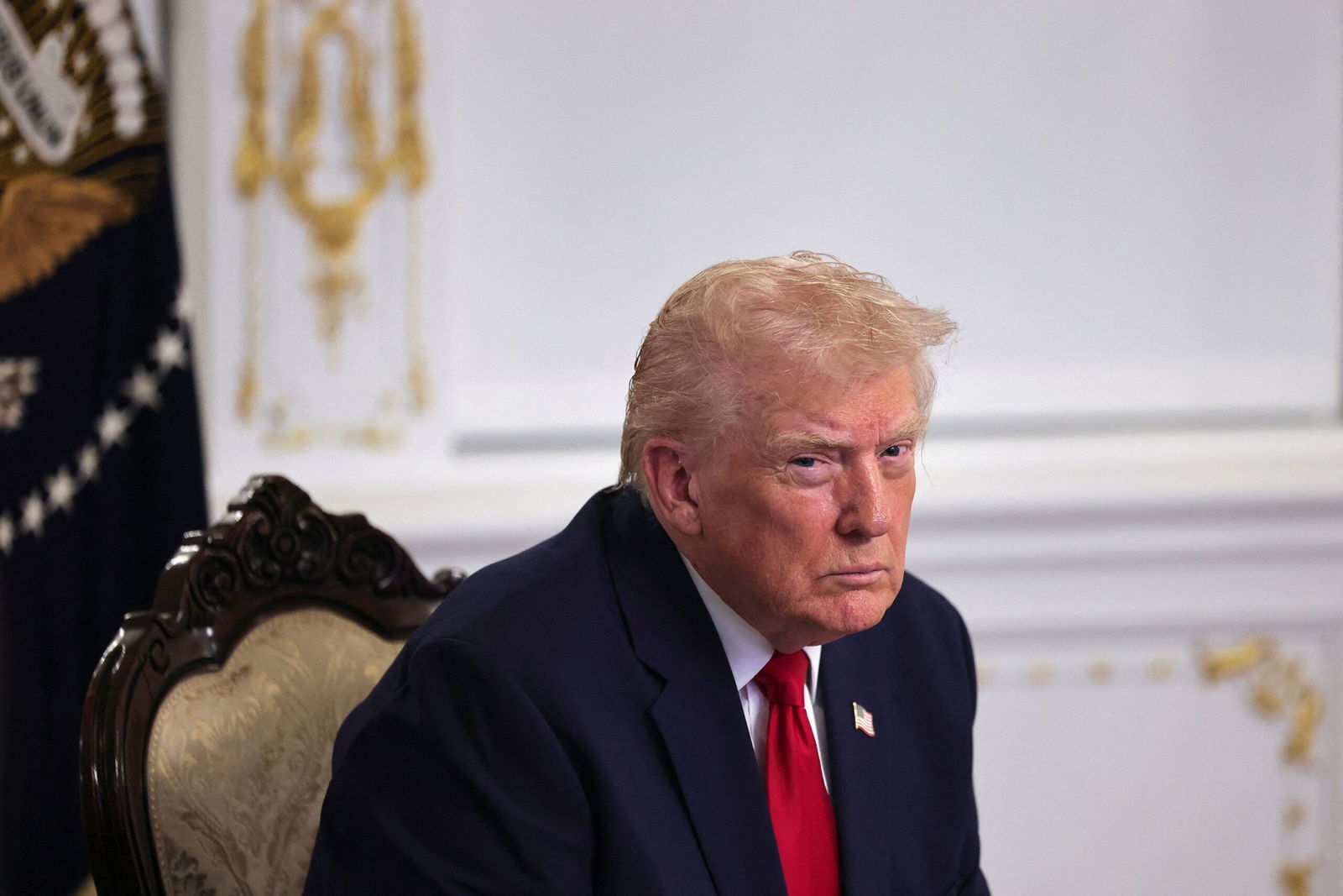 <i>Anna Rose Layden/Reuters via CNN Newsource</i><br/>President Donald Trump participates in a Thanksgiving call with service members in Palm Beach