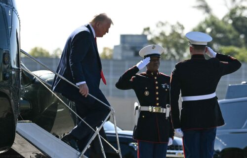 President Donald Trump steps off Marine One as he arrives to Walter Reed National Military Medical Center to receive a medical checkup in Bethesda