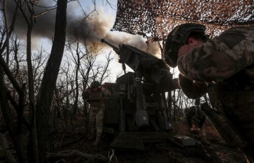 A Ukrainian soldier fires towards Russian troops at a position on the front line near Pokrovsk