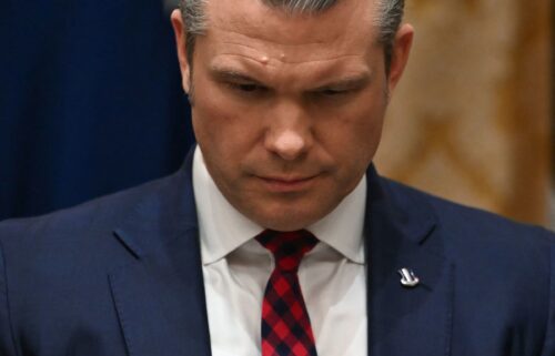 Secretary of Defense Pete Hegseth listens as President Donald Trump speaks during a Cabinet meeting at the White House