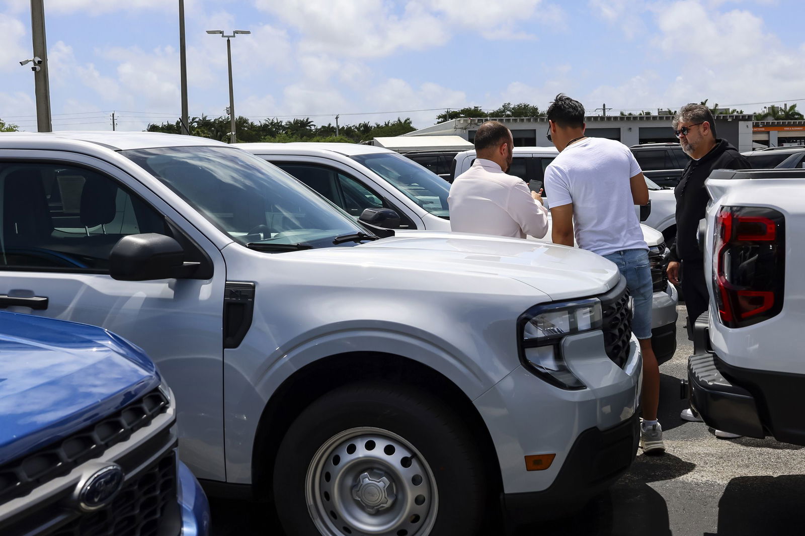 <i>Eva Marie Uzcategui/Bloomberg/Getty Images via CNN Newsource</i><br/>Customers browse new vehicles displayed for sale at a Ford Motor Co. dealership in Miami
