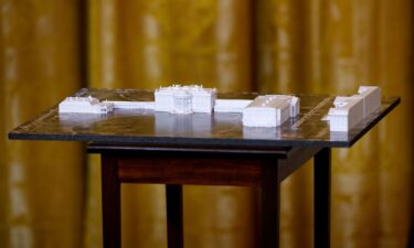 A model of the White House and proposed ballroom is displayed during a fundraising dinner with President Donald Trump in the East Room of the White House on October 15.